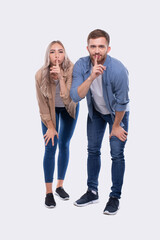 Fototapeta premium Couple Silence Sign. Couple Shush. Couple Standing Isolated Leaning Forward Sign