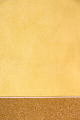 Wall gold cement with brown stone patterns on background
