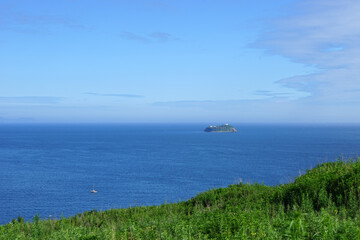 Seascape with a view of a small island.