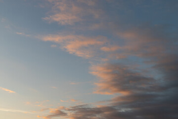 Naklejka na ściany i meble Beautiful cloud formation on sunrise sky.