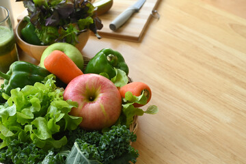 Organic vegetables and fruits on wooden table. Healthy food concept.