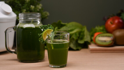Fresh green vegetables detox smoothie on wooden table. Healthy lifestyle concept.