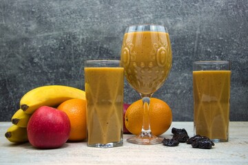Fruit cocktails in glasses on the table. Close-up.