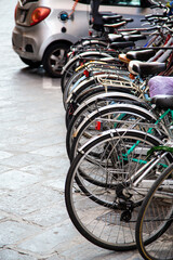 Fototapeta na wymiar Bicycles tide up on an Italian street