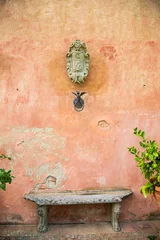 Papier Peint photo Toscane Fountains, terracotta walls and tall trees of a Tuscan villa, Italy
