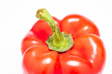 A red bell pepper or paprika in white, Vegetable or food background, Nobody	