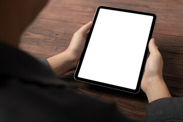 mock up of digital tablet or smartpad with blank screen on businessman hand.