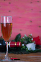 Valentines day background with champagne glasses and red roses