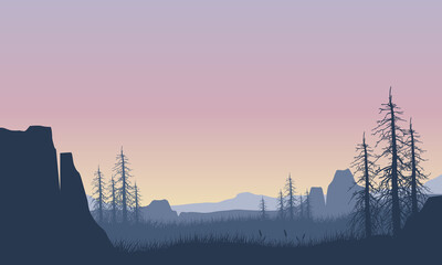 An aesthetic silhouette of mountains with dry trees from the edge of a high cliff