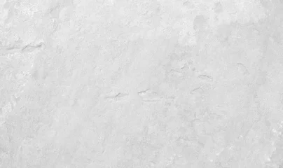 Fotobehang White stone texture for wallpaper or graphic design. © Nongnuch