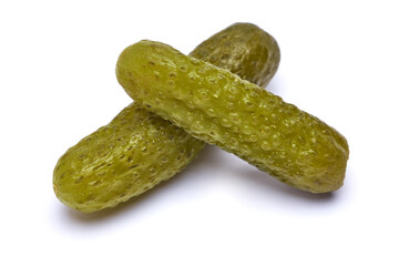 Tasty Whole green cornichon isolated on a white background