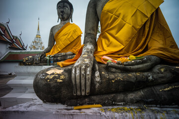 Old Buddha Statue at Wat Phra Borommathat Chaiya Temple in Surat Thani Province, Thailand