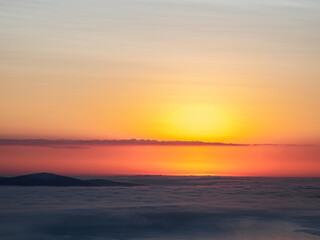 Beautiful Arctic sunset. Scenic colorful sky at dawn. Aerial view of sunrise bright sky. Top View from high altitude.