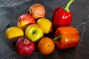Assorted organic vegetables and fruits in a wicker basket