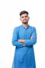 Indian man in tradition wear and giving expression on white background.