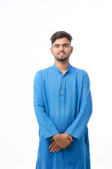 Fototapeta premium Indian man in tradition wear and giving expression on white background.