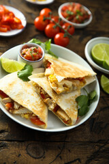 Homemade quesadilla with chicken and tomatoes