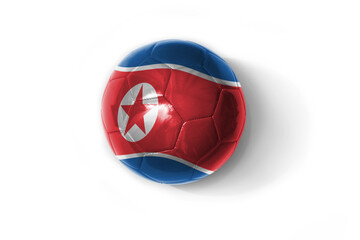 Obraz premium realistic football ball with colorfull national flag of north korea on the white background.