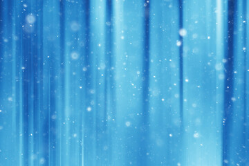 blue snow lines background / abstract background christmas blue snowflakes blurred background, snow flakes