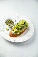 Healthy homemade avocado toast on a plate