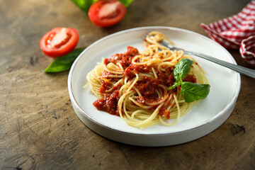 Spaghetti with homemade tomato sauce and basil