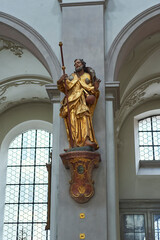 polychrome sculpture of pilgrim saint james inside the central nave in St. Peter's Church