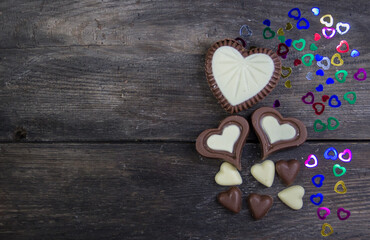 heart shaped chocolates on rustic wood