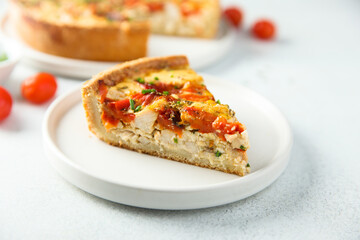 Homemade chicken quiche with tomatoes and pepper