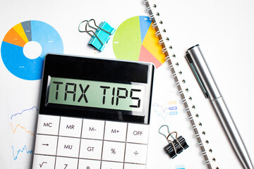 TAX TIPS number on a calculator. The new year 2022 tax concept