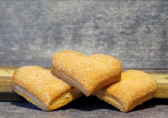 Three rosy cookies in the form of hearts