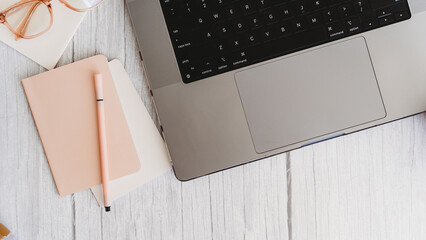 Computer on desk flatlay