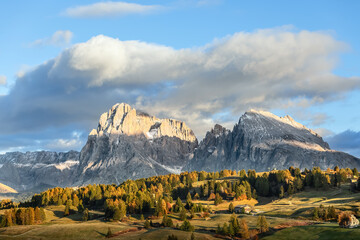 Iconic view of Seiser Alm (Alpe di Siusi) with Sassolungo and Sassopiatto mountains. South Tyrol,...