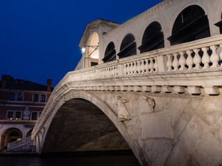 Fototapeta na wymiar Rialto Bridge or Ponte die Rialto in Venice, Italy, Illuminated at Night