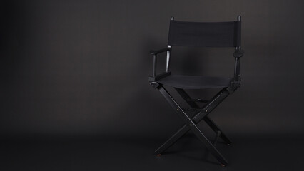 Black director chair use in video production , film, cinema industry on black background