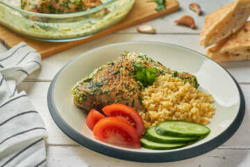 shkmeruli chkmeruli georgian cuisine chicken in a milk-garlic sauce with bulgur and vegetables
