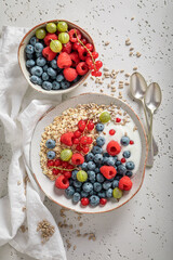Tasty oats with berry fruits and yoghurt.