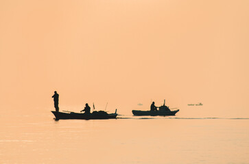 boat fisherman silhouette standing shadow
