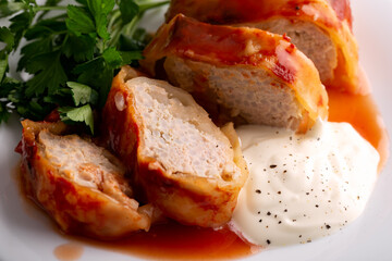 Cabbage rolls stuffed with mince beef, rice, tomato sauce and sour cream