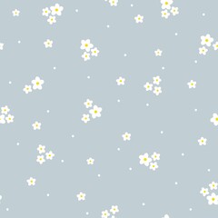 Seamless vintage pattern. Small white flowers and leaves, dots. Light blue background. vector texture. fashionable print for textiles, wallpaper and packaging.