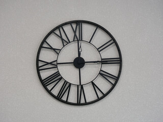 round black clock on the wall