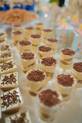 licorice desserts in cups with chocolate