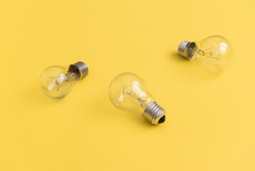 Light bulbs on yellow background