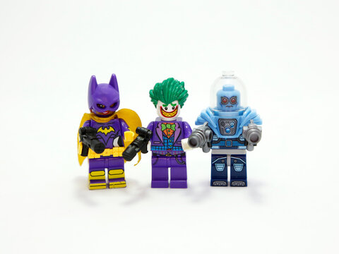 Joker, Catwoman and Mr Freeze. Lego Marvel. Villain. Arthur Fleck. Selina Kyle. Batman and Robin enemy. Arch enemy. Clown. Cat. Evil laugh. Toy figure. Toy Classic. Marvel. DC comics. Isolated white.