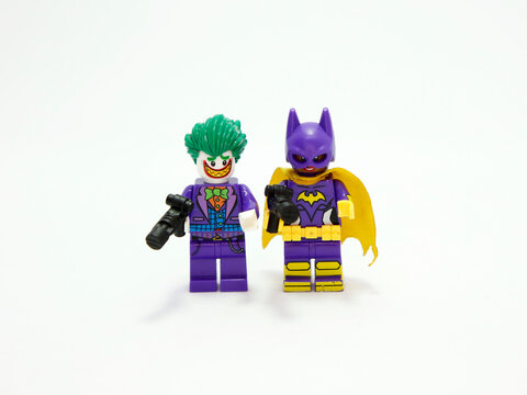 Joker and Catwoman. Lego Marvel. Villain. Arthur Fleck. Selina Kyle. Batman and Robin enemy. Arch enemy. Clown. Cat. Evil laugh. Toy figure. Toy Classic. Marvel. DC comics. Isolated white.