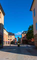 The historic center of Falun town with cafe, residential buildings and beautiful fountain