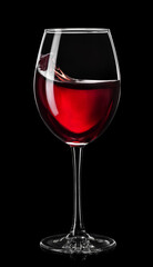moving red wine in glass isolated on black