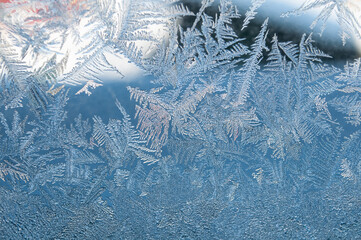 Abstract frosty pattern on glass, background texture.
