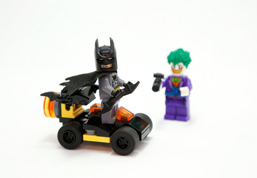 Batman and Joker. Lego toys. Bat super hero. The knight of the night. Toy figure. Toys Classic super hero who flies. Marvel. DC comics. Isolated white. Arch enemy. Batmobile. Vehicle. Clown. Evil.
