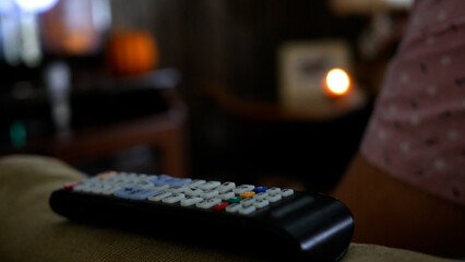 Generic Remote Control Sitting On Couch
