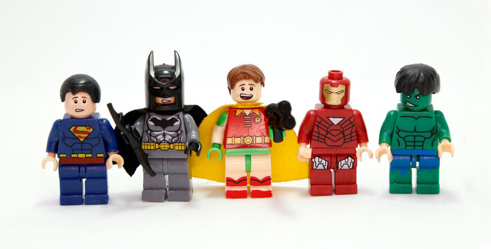 Lego Marvel. Superheroes. Robin, Hulk, Ironman, Batman, Superman. Toys for childrens. Small plastic figures. Fight of good against evil. Isolated white. 